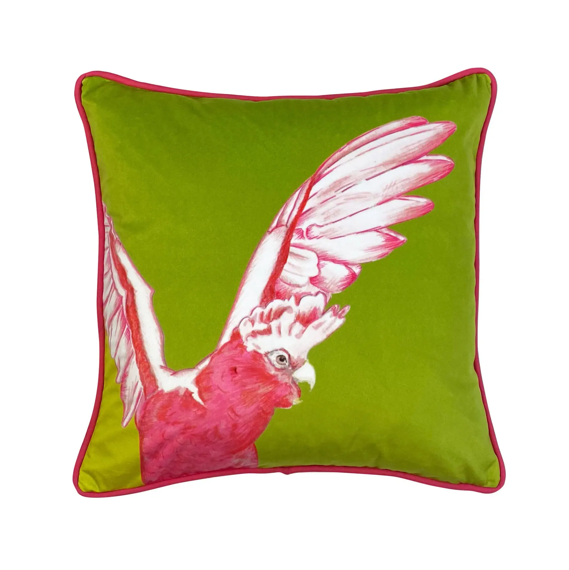 Cockatoo velvet cushion: a pink cockatoo with its wings raised, on lime green velvet with cerise pink piping